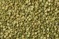 Green organic split peas close up