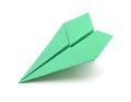 A green origami plane on white