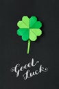 Green origami shamrock clover leaf paper background. St. Patrick Royalty Free Stock Photo