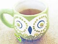 Green owl mug with tea watercolor still life illustration