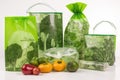 green packaging with vegetable and fruit drawings on the background