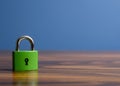 A green padlock. preservation of secrets, information and values. Protection, insurance and hacking attack concept. Royalty Free Stock Photo