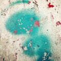 Green paint on concrete surface - toned filter. Red blotches.