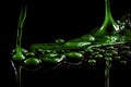 Green paint splashing on a black background. macro. Royalty Free Stock Photo