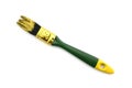 Green paintbrush with dried gold color stain and size number on shiny metallic brass ferrule