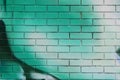 green painted brick wall , graffiti background Royalty Free Stock Photo