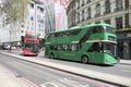 Green and red double-decker buses in London,UK.