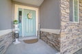 Green painted front door to a suburban house Royalty Free Stock Photo