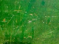 Green painted metal texture with scratches and rust