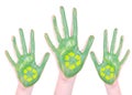 Green painted recycle hands