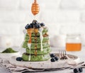 Green pancakes with matcha tea