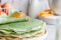 Green pancakes with matcha tea and mango jam Royalty Free Stock Photo