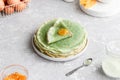 Green pancakes with matcha tea and mango jam Royalty Free Stock Photo