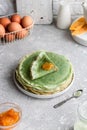 Green pancakes with matcha tea and mango jam Royalty Free Stock Photo