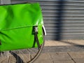 Green pannier on a bicycle