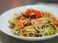 Green papaya salad with tomato chilli and garlic, add shrimps Serve with vegetables on the table, Thai food Taste sour sweet spicy Royalty Free Stock Photo