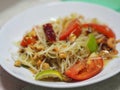 Green papaya salad with tomato chilli and garlic, add shrimps Serve with vegetables on the table, Thai food Taste sour sweet spicy Royalty Free Stock Photo