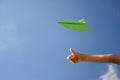 Green paper airplane