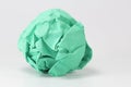 Green paper balls on gray background Royalty Free Stock Photo