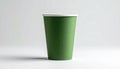 Green paper cup with white lid isolated on white background studio shot Royalty Free Stock Photo