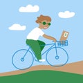 Green parcels delivery by bike. Guy cyclist with a package on minimalistic nature background. Eco friendly delivery concept Royalty Free Stock Photo