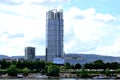 green park along the Danube river in Budapest. tall glass office tower and condominiums beyond Royalty Free Stock Photo