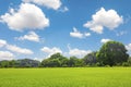 Green park outdoor with blue sky cloud Royalty Free Stock Photo