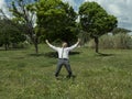 businessman jumping, in a park Royalty Free Stock Photo