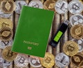 Green passport, metal coins background. US dollars. Metal coins. Gold silver bitcoin, crypto currency, identification. Memory card Royalty Free Stock Photo