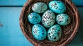 On a green pastel canvas, a colorful Easter egg and nest sit amidst an expanse of space Royalty Free Stock Photo