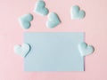 Green pastel card hearts on pink textured background Royalty Free Stock Photo
