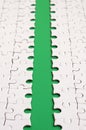 The green path is laid on the platform of a white folded jigsaw puzzle. Texture image with copy space for text Royalty Free Stock Photo