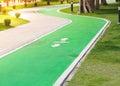 Green path way for workout or running and walk way in public park garden Royalty Free Stock Photo