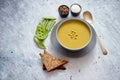 Green pea cream soup in grey bowl Royalty Free Stock Photo