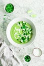 Green pea cream soup with parsley and lime Royalty Free Stock Photo