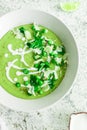 Green pea cream soup with parsley and lime Royalty Free Stock Photo