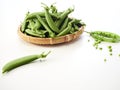 green pea pod In a bamboo container