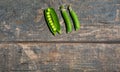 Green pea stalks on a wooden texture. Boards. Cooking, gardening, vegetable garden Royalty Free Stock Photo