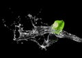 Green Pear In Water Splash Royalty Free Stock Photo