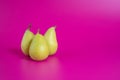 Green pears on background