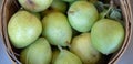 Green pears in basket at farmers market Royalty Free Stock Photo