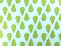 Green pears on blue food background