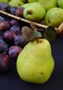 Green pears and italian plums