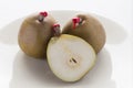 Green pears with red sealing wax