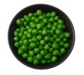 Green peas in black bowl isolated on white background. top view Royalty Free Stock Photo