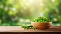 Green peas in a bowl against the backdrop of the garden. Selective focus.