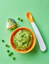 Green peas and broccoli baby puree from above Royalty Free Stock Photo