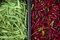 Green peas and chilli peppers in boxes Royalty Free Stock Photo