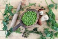 Green peas and mushrooms in a woode