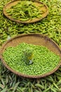 Green peas, Pisum sativum, being sold at local food market. Royalty Free Stock Photo